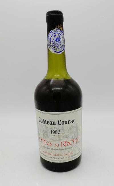 Вино 1986 "Cotes du Rhone". Упаковка не повреждена. Этикетка в хорошей сохранности. В комплект входит подарочная упаковка в виде футляра для бутылки